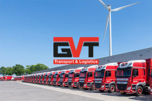 foto van vrachtwagens op het distributiecentrum van GVT transport & logistics met het logo op de foto